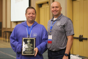 John Bush, of the Delaware County Probation Department, is presented the “Line Probation Officer of the Year Award.”